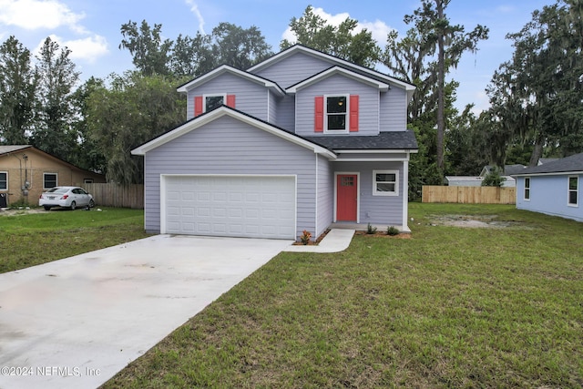 front facade featuring a garage and a front yard