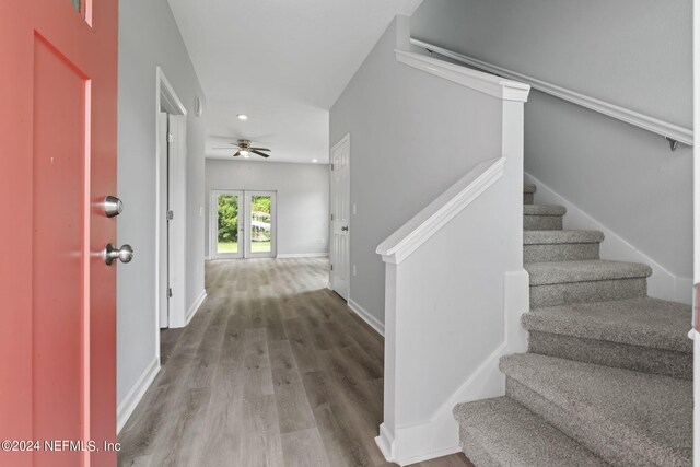 interior space with french doors, hardwood / wood-style floors, and ceiling fan