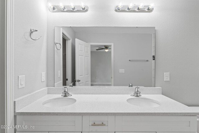 bathroom with vanity and ceiling fan