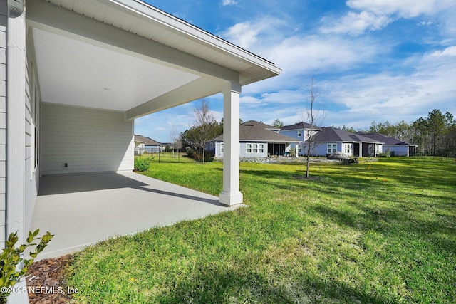 view of yard with a carport