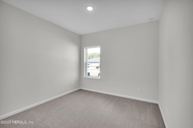 view of carpeted spare room