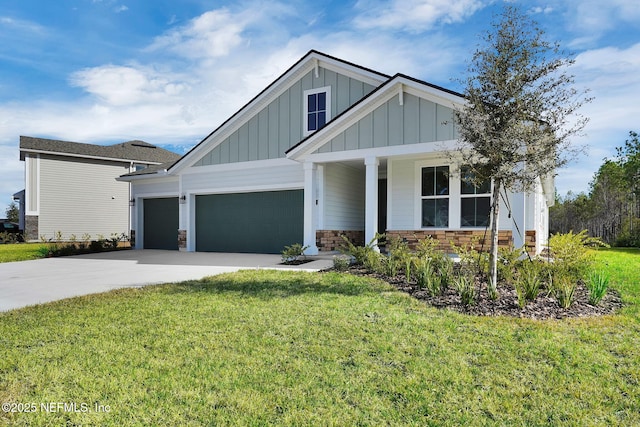 craftsman-style home with a garage, a front yard, and covered porch