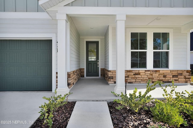 doorway to property featuring a garage