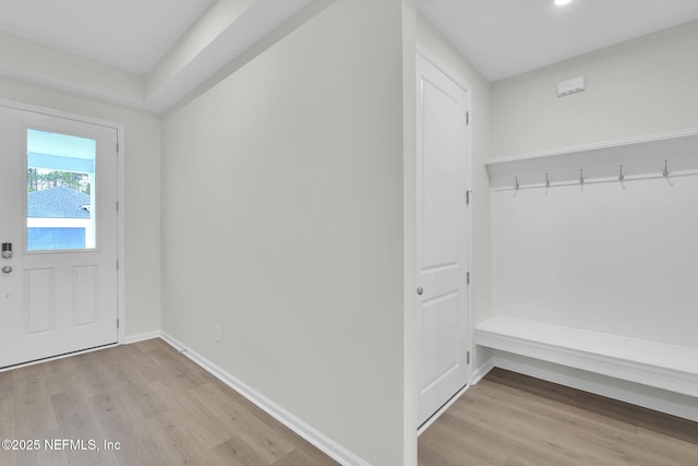 mudroom with light hardwood / wood-style flooring