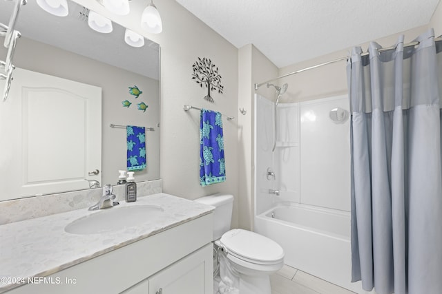 full bathroom featuring vanity, a textured ceiling, shower / tub combo, tile patterned floors, and toilet