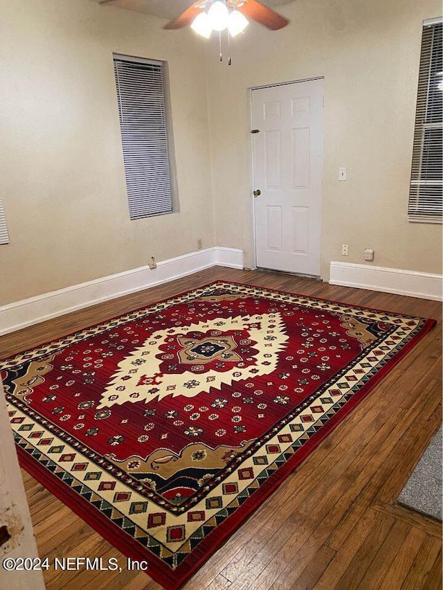 foyer featuring ceiling fan and hardwood / wood-style flooring