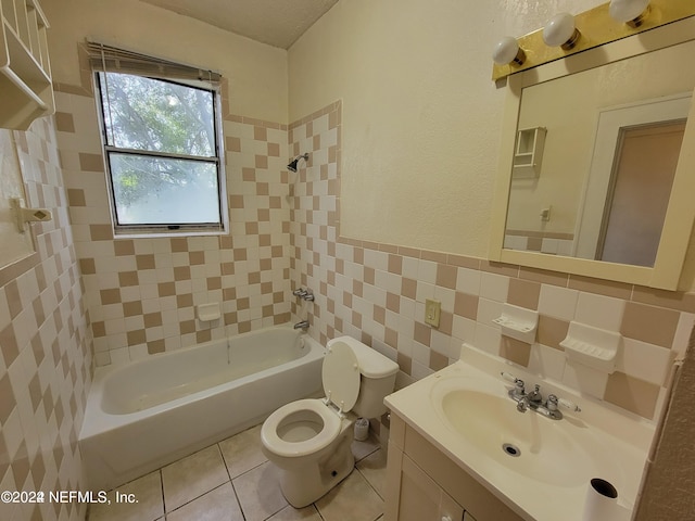 full bathroom with vanity, toilet, tasteful backsplash, and shower / bath combo