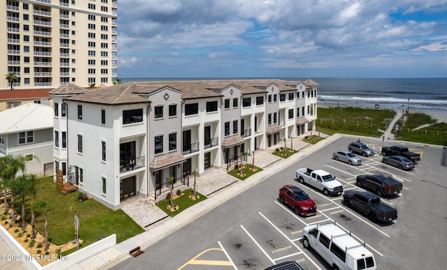 exterior space with a water view