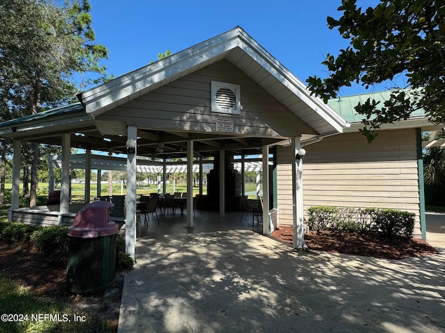 view of home's community with a patio area