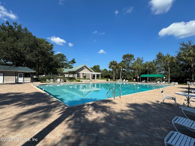 view of pool with a patio