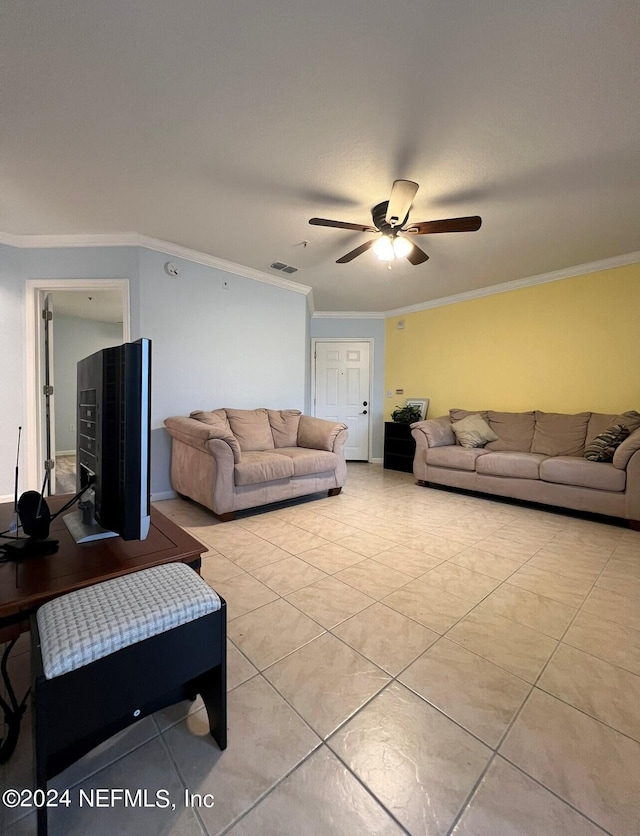 living room featuring crown molding, light tile patterned floors, and ceiling fan