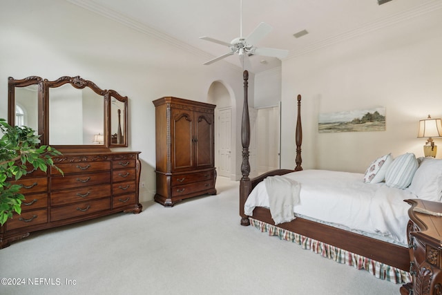 bedroom with light carpet, ornamental molding, and ceiling fan