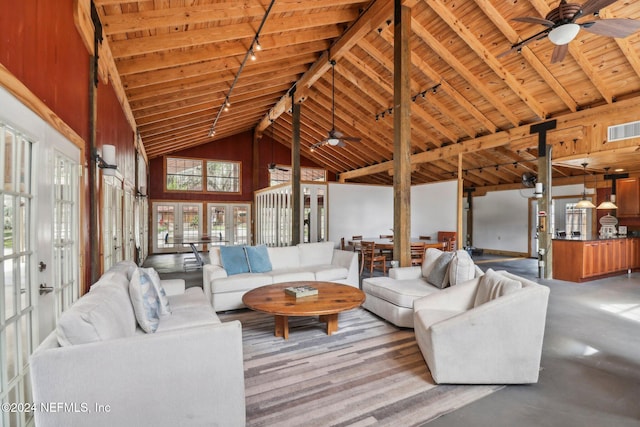 living area with visible vents, a ceiling fan, wooden ceiling, high vaulted ceiling, and track lighting