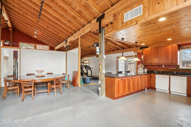 kitchen with concrete flooring, white dishwasher, dark countertops, and visible vents