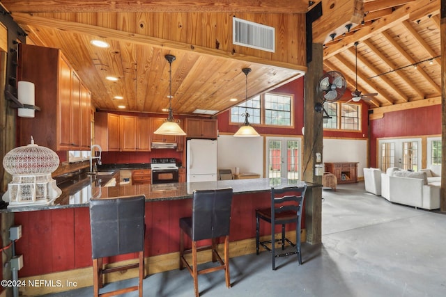 kitchen with a sink, visible vents, electric stove, french doors, and freestanding refrigerator