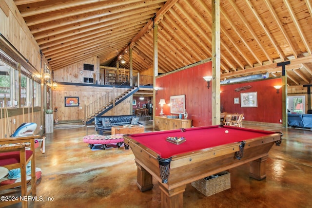 recreation room featuring concrete flooring, billiards, and high vaulted ceiling