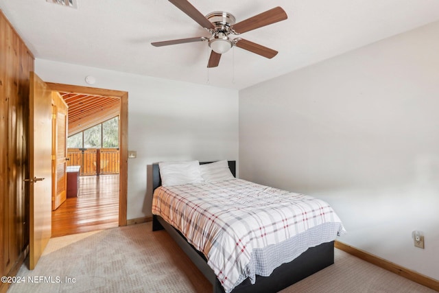 carpeted bedroom featuring visible vents, ceiling fan, and baseboards