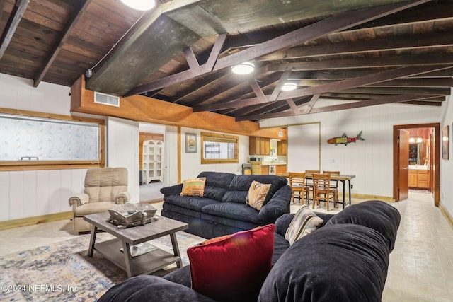 living room with wooden ceiling, visible vents, lofted ceiling with beams, and baseboards