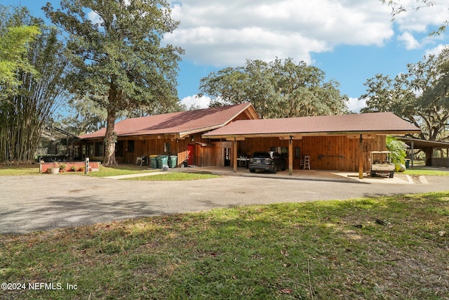 exterior space featuring a front lawn