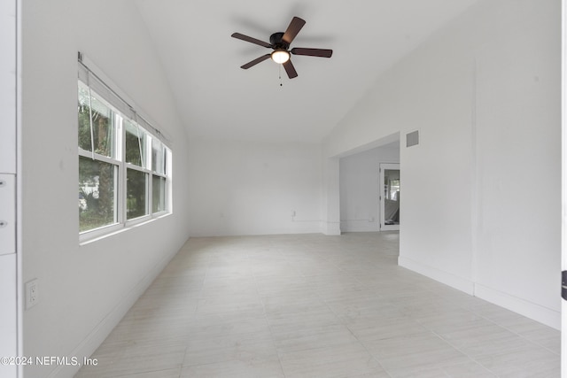 unfurnished room featuring vaulted ceiling and ceiling fan