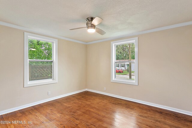 unfurnished room with ornamental molding, a textured ceiling, hardwood / wood-style flooring, and ceiling fan