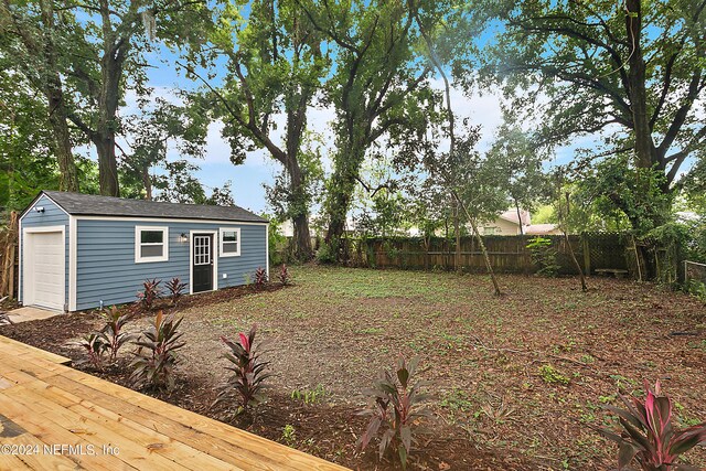 view of yard with an outdoor structure