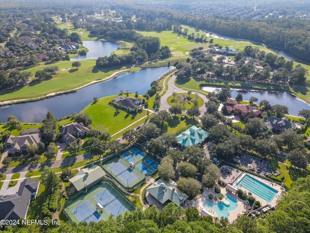 birds eye view of property featuring a water view