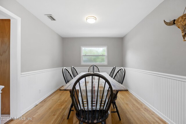 dining area featuring hardwood / wood-style flooring