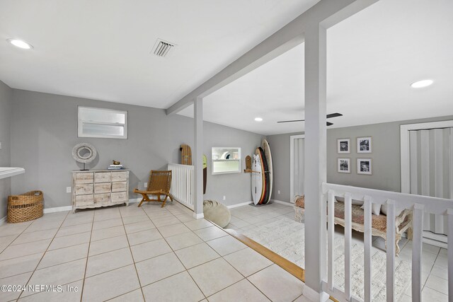 interior space with light tile patterned floors