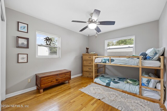 bedroom featuring ceiling fan and hardwood / wood-style floors