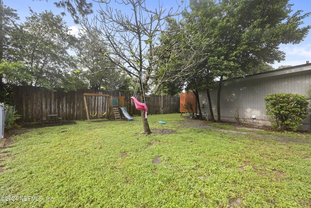 view of yard featuring a playground