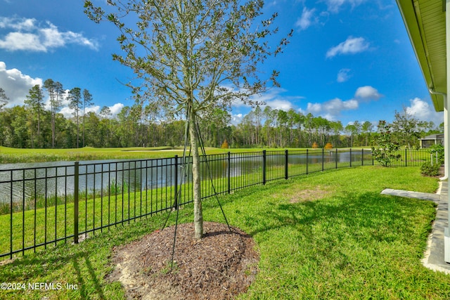 view of yard with a water view