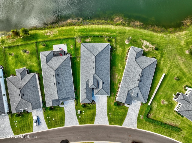 bird's eye view with a water view