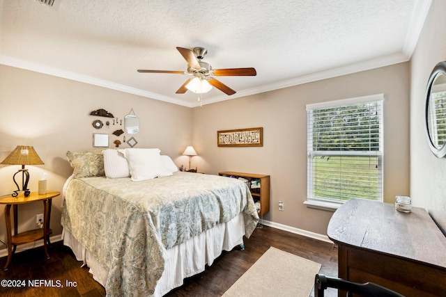 bedroom featuring a textured ceiling, ornamental molding, dark hardwood / wood-style floors, and ceiling fan