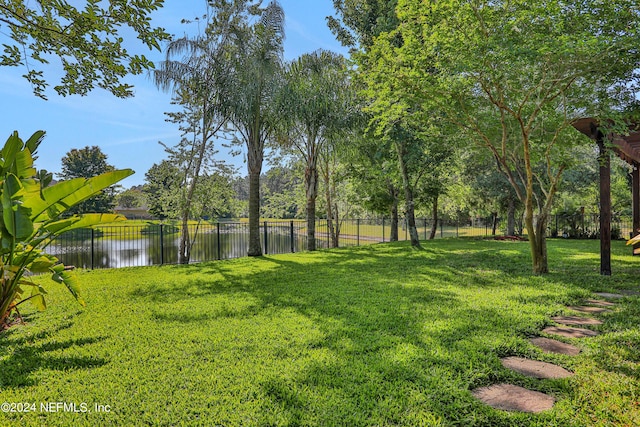 view of yard with a water view