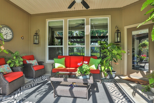 view of patio with ceiling fan and outdoor lounge area