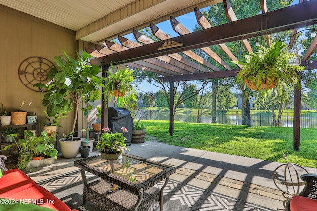 view of patio / terrace with grilling area, a water view, and a pergola