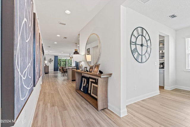 hall featuring light hardwood / wood-style flooring