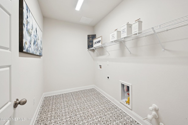 clothes washing area with laundry area, baseboards, gas dryer hookup, washer hookup, and electric dryer hookup