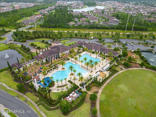 birds eye view of property featuring a water view