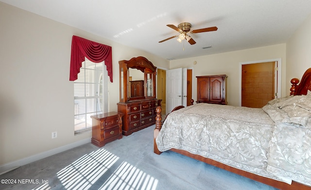 carpeted bedroom featuring ceiling fan