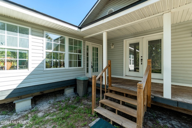 entrance to property with a porch