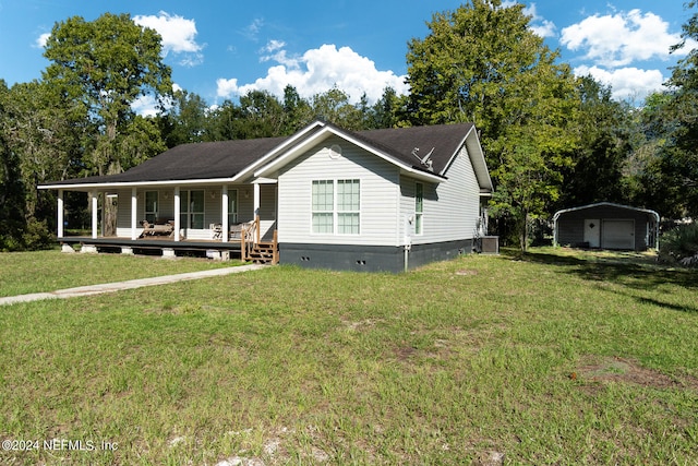 view of front of property with covered porch, a front lawn, and cooling unit