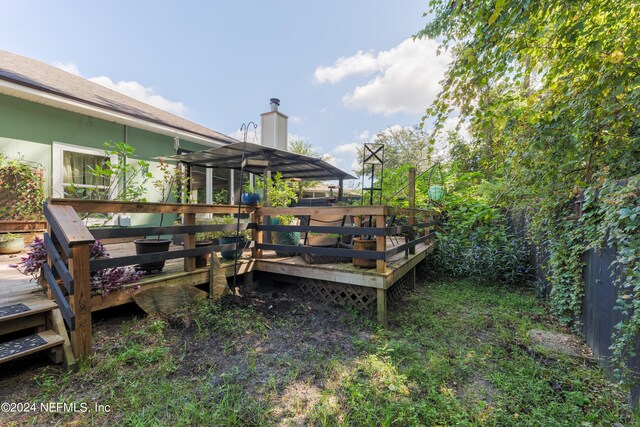 view of yard featuring a deck