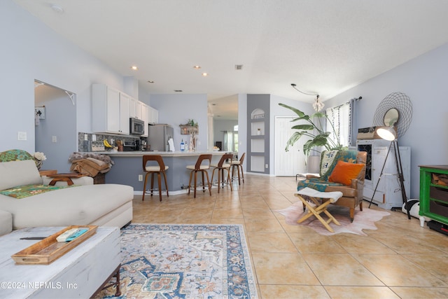 living room featuring light tile patterned floors