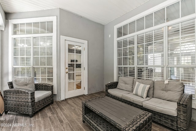 living room with wood-type flooring and wood ceiling