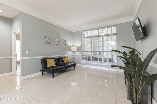 sitting room featuring ornamental molding and light tile patterned floors