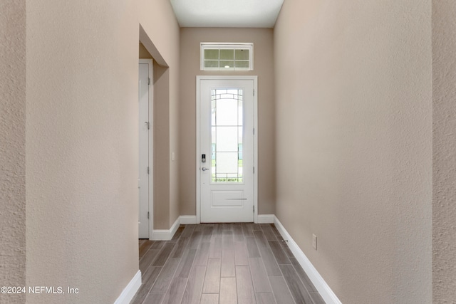 doorway to outside with hardwood / wood-style flooring