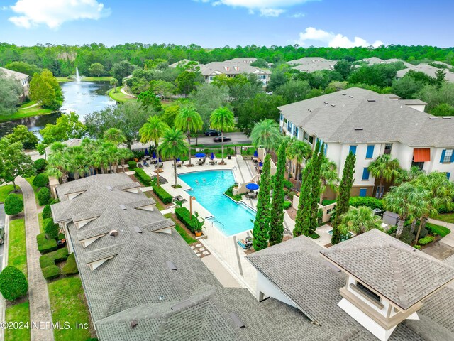 view of pool with a water view