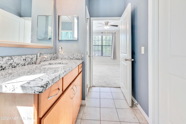 12700 Bartram Park Blvd Unit 124, Jacksonville, FL 32258 - bathroom featuring tile patterned floors, baseboards, vanity, and a ceiling fan